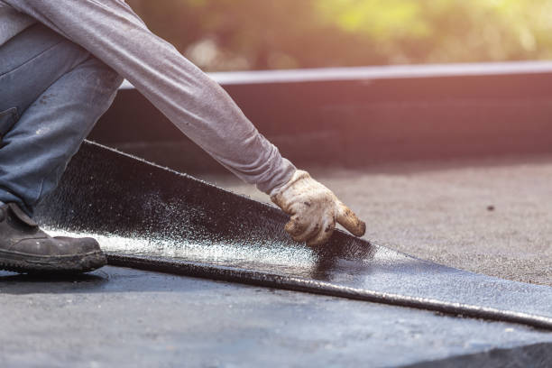 Professional Basement Waterproofing technician working in Lena, WI